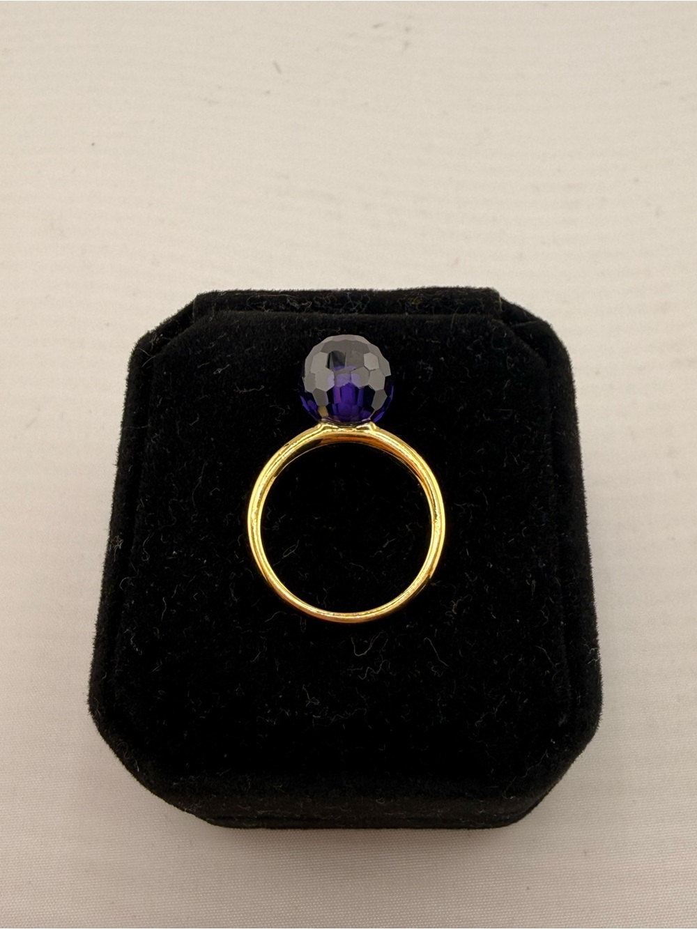 Henri Bendel Gold Tone Ring with Deep Purple Faceted Stone